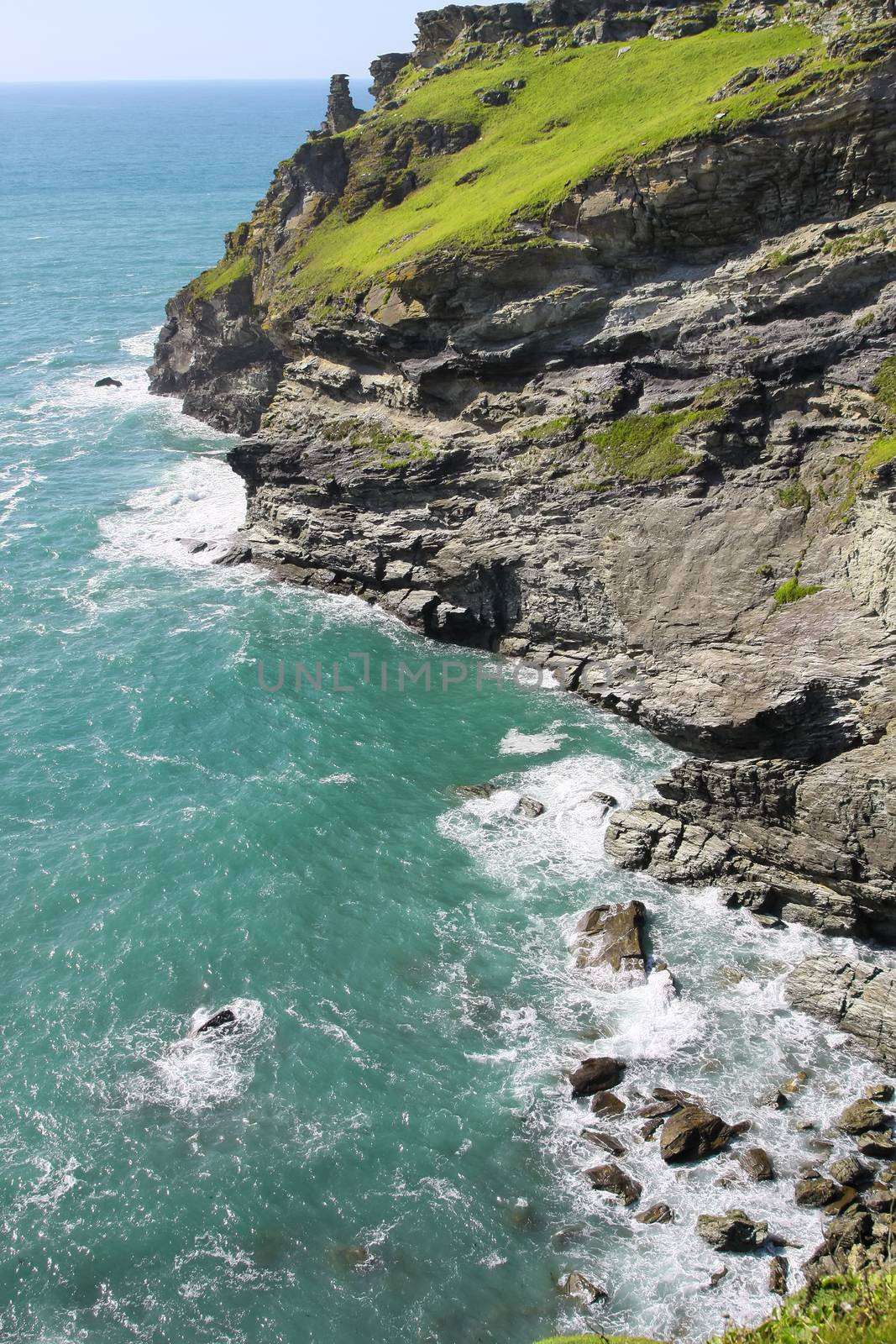 A photography of a rough coast in cornwall