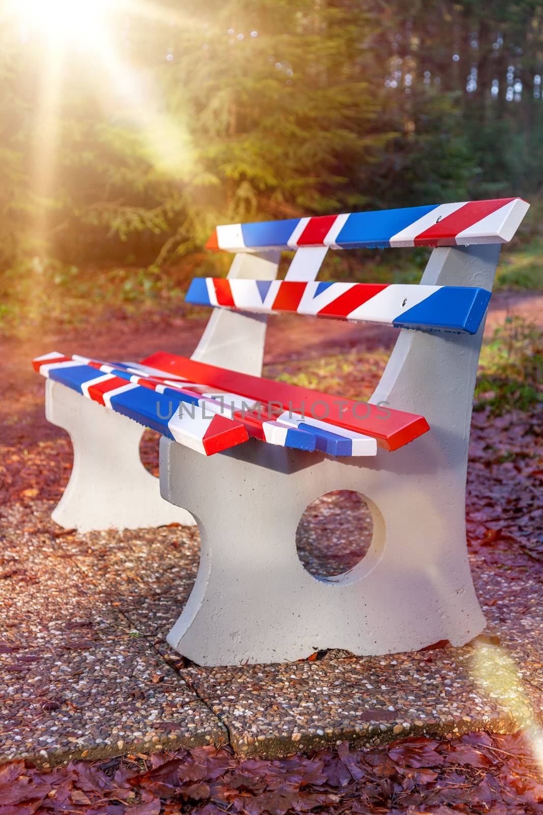 An image of a bench in Great Britain Union Jack flag colors