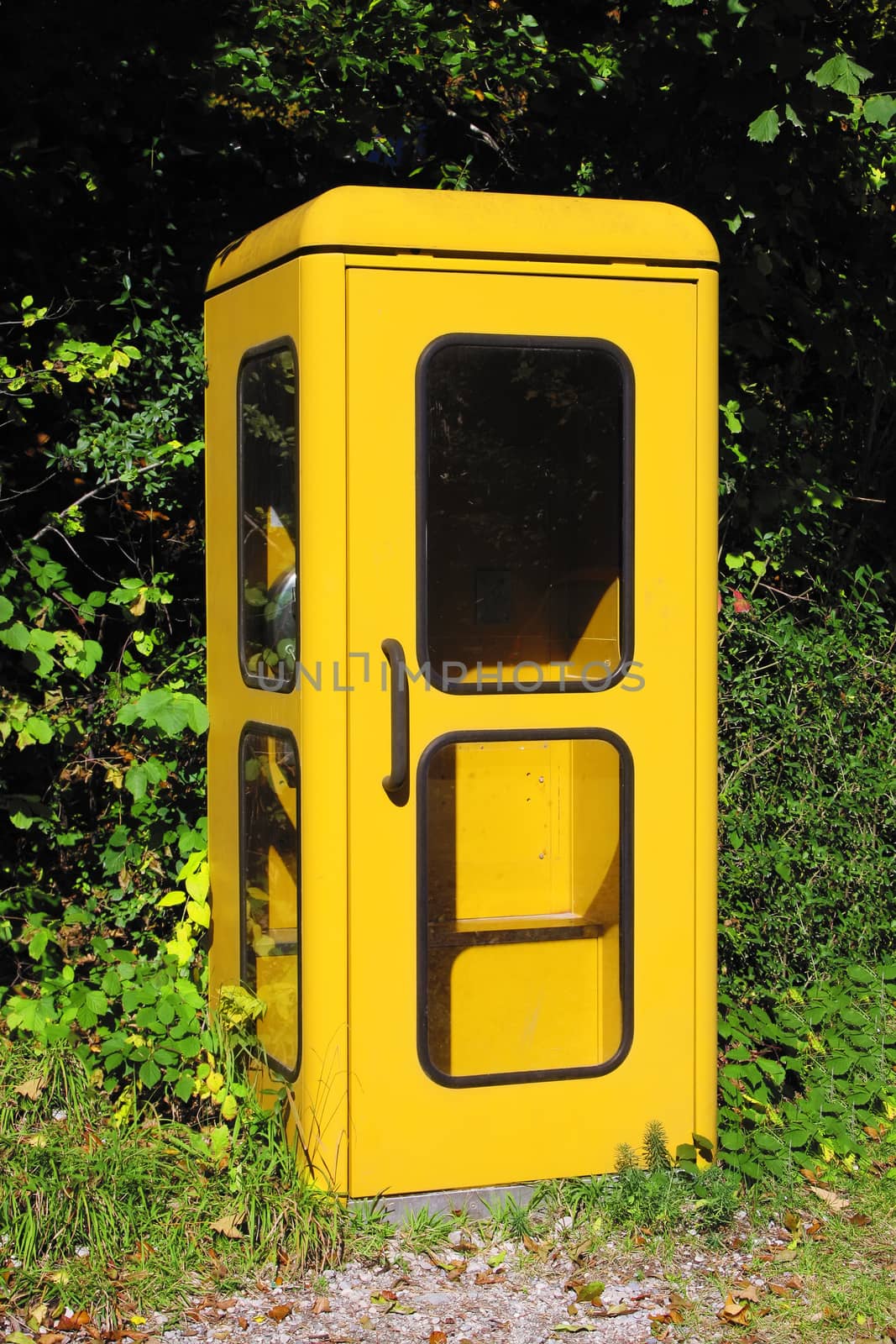 vintage yellow german phone box by magann