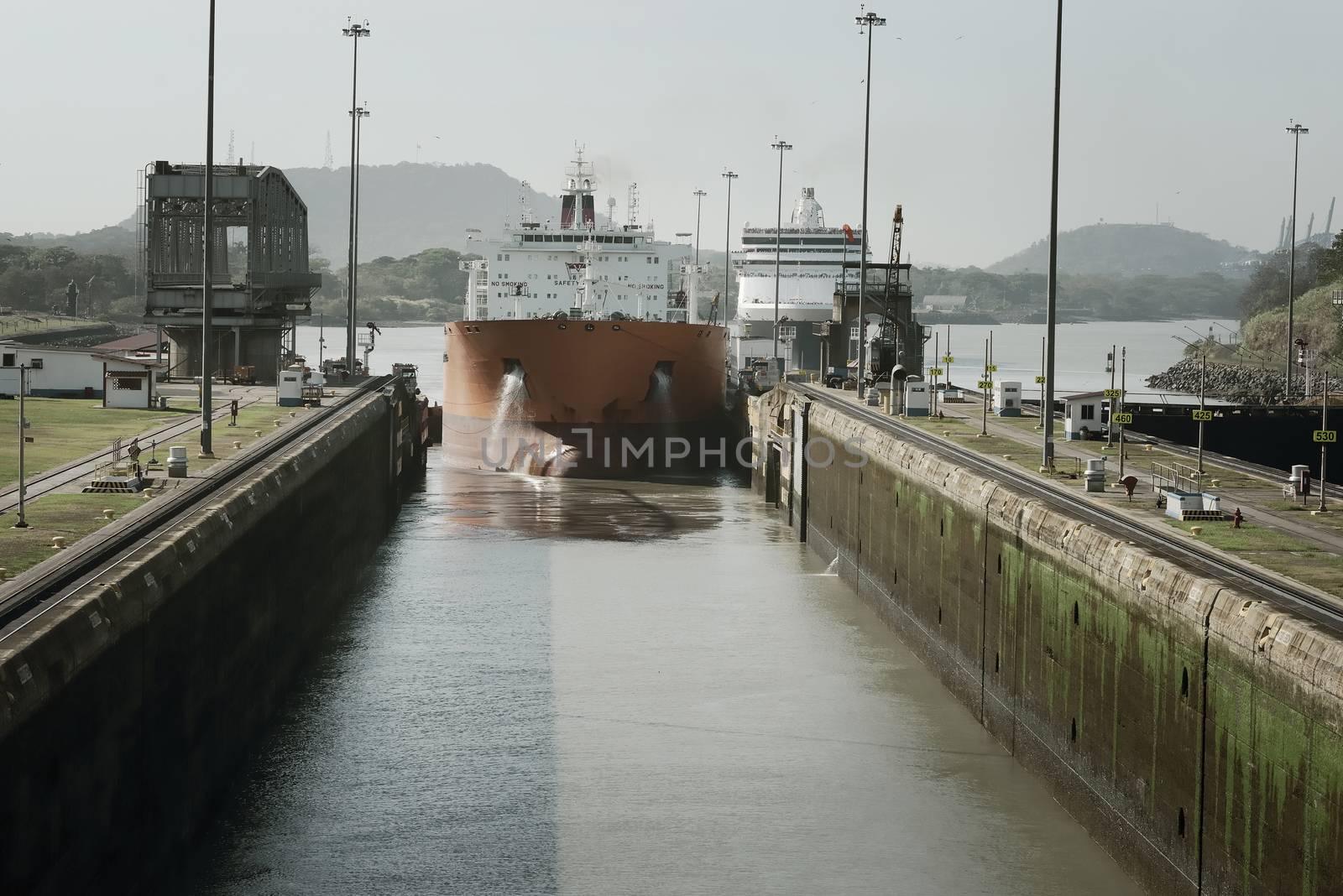 Large Cargo Ship Entering Miraflores Locks At Panama Canal, Panama