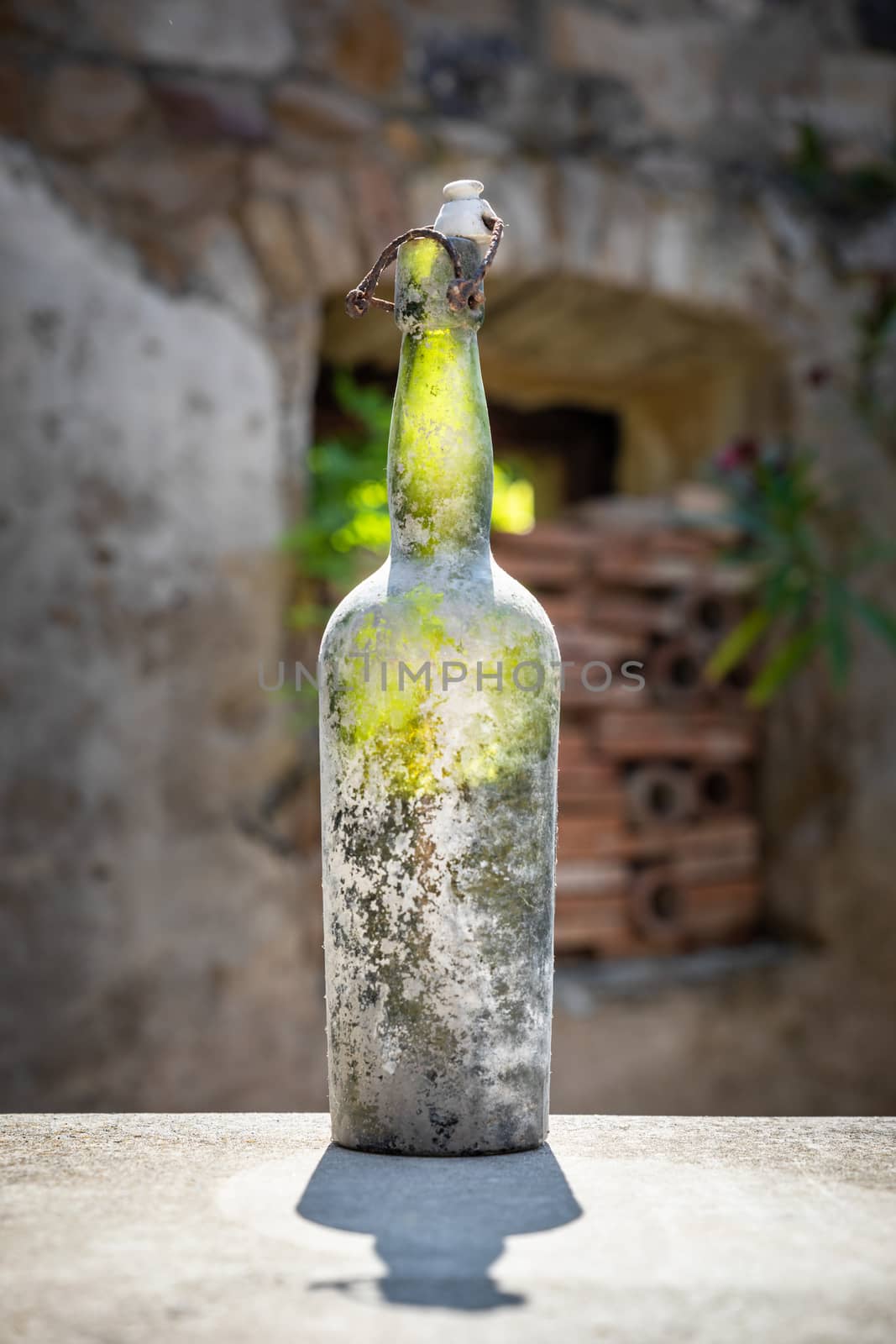 dirty old wine bottle by magann