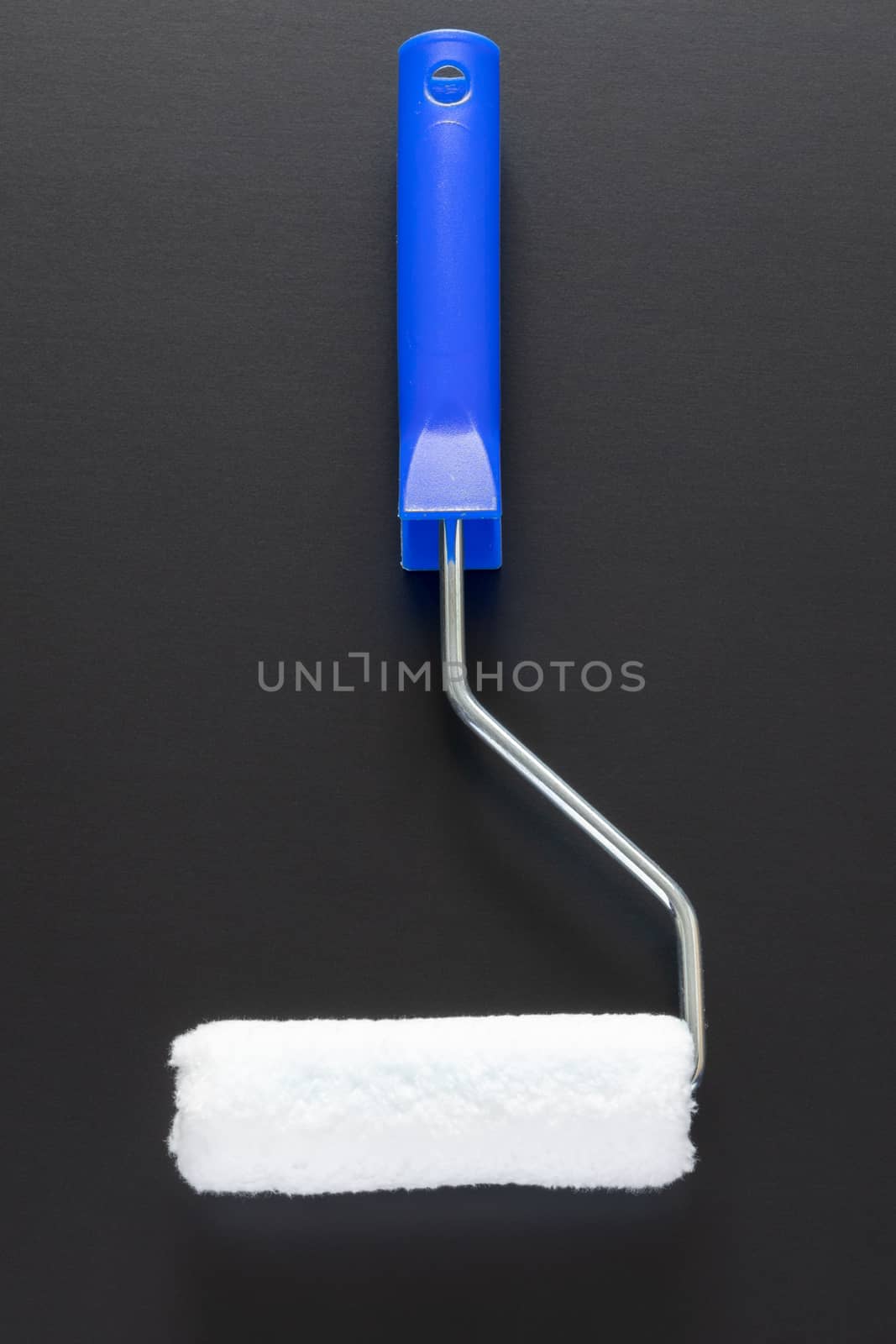 painting roller isolated on black background by magann