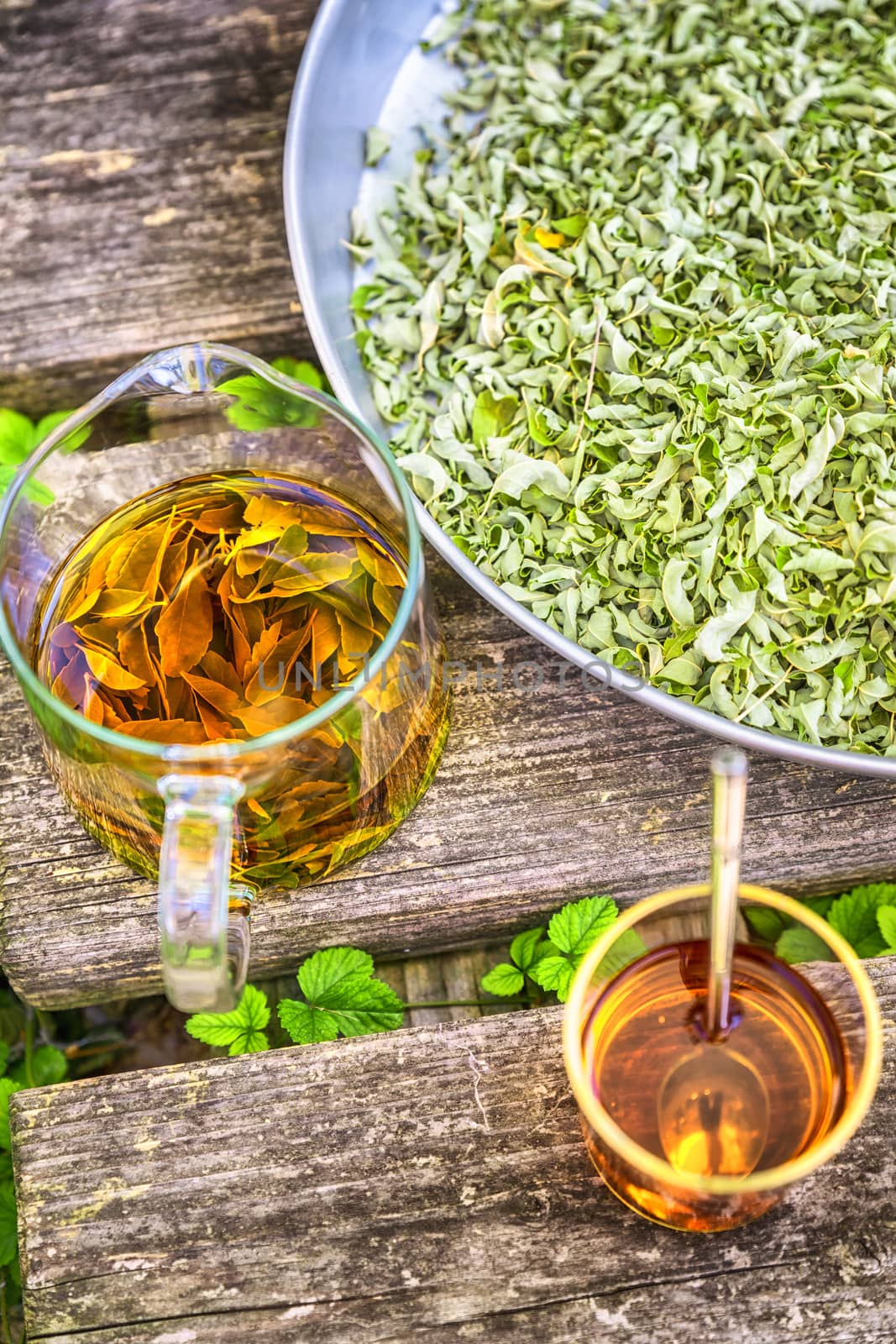 verbena tea on old wooden planks by magann