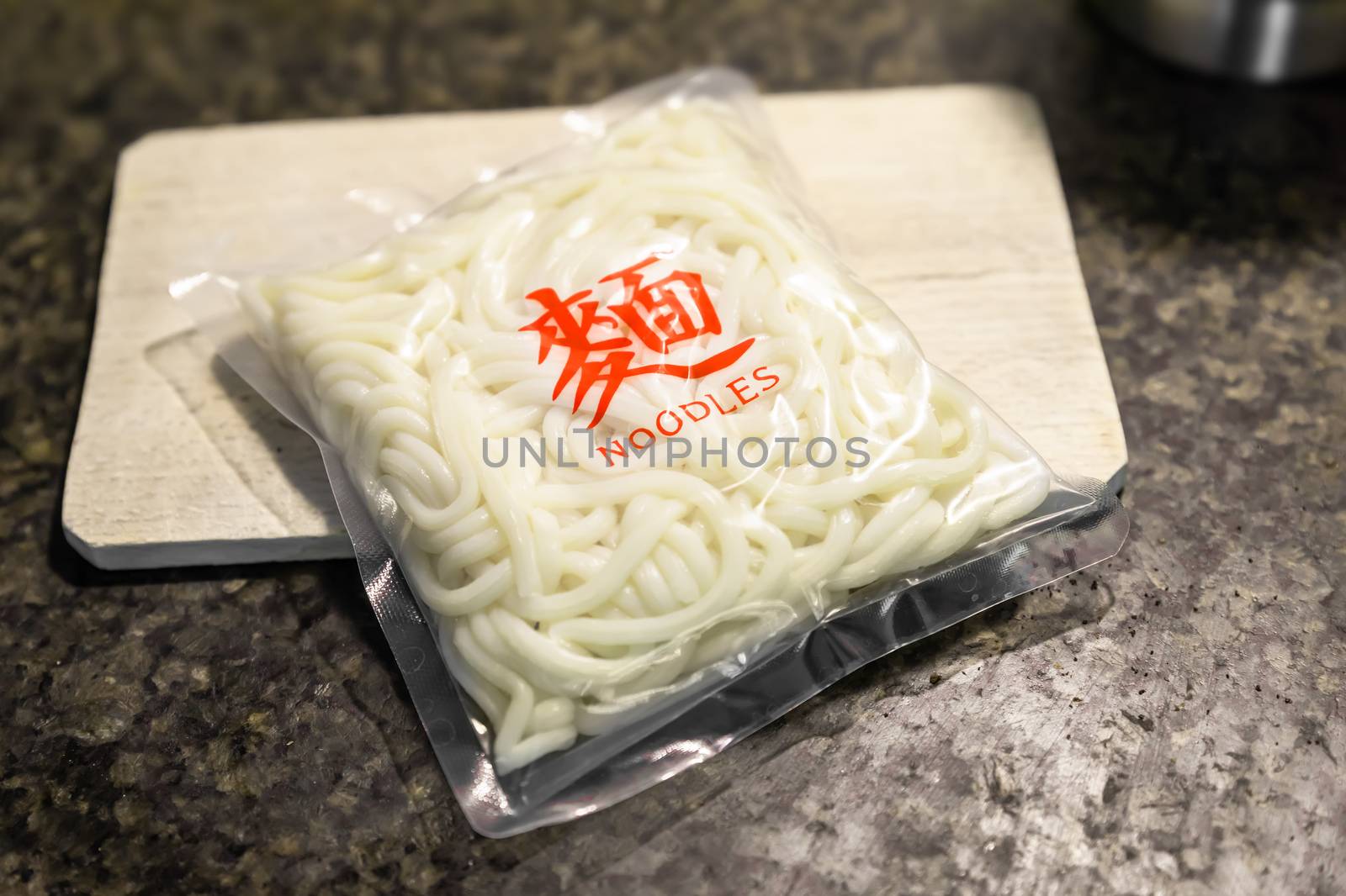 pack of noodles with the word noodles in Chinese characters by magann