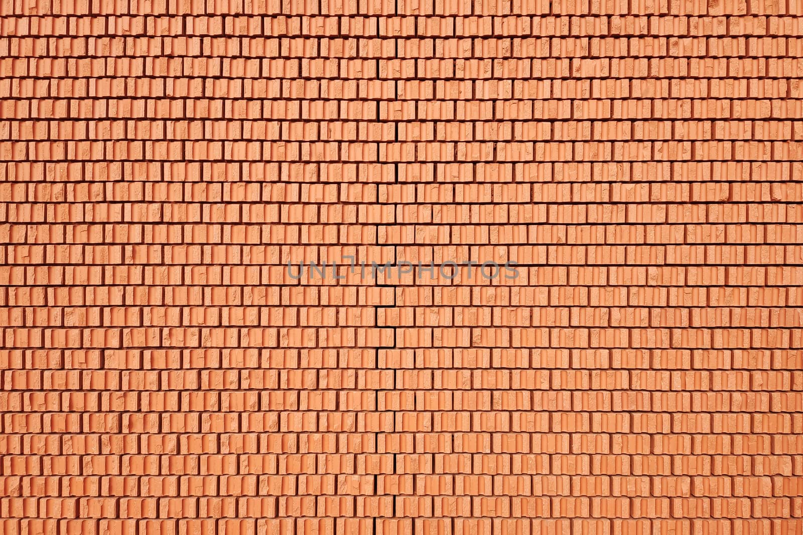 An image of a red brick wall background