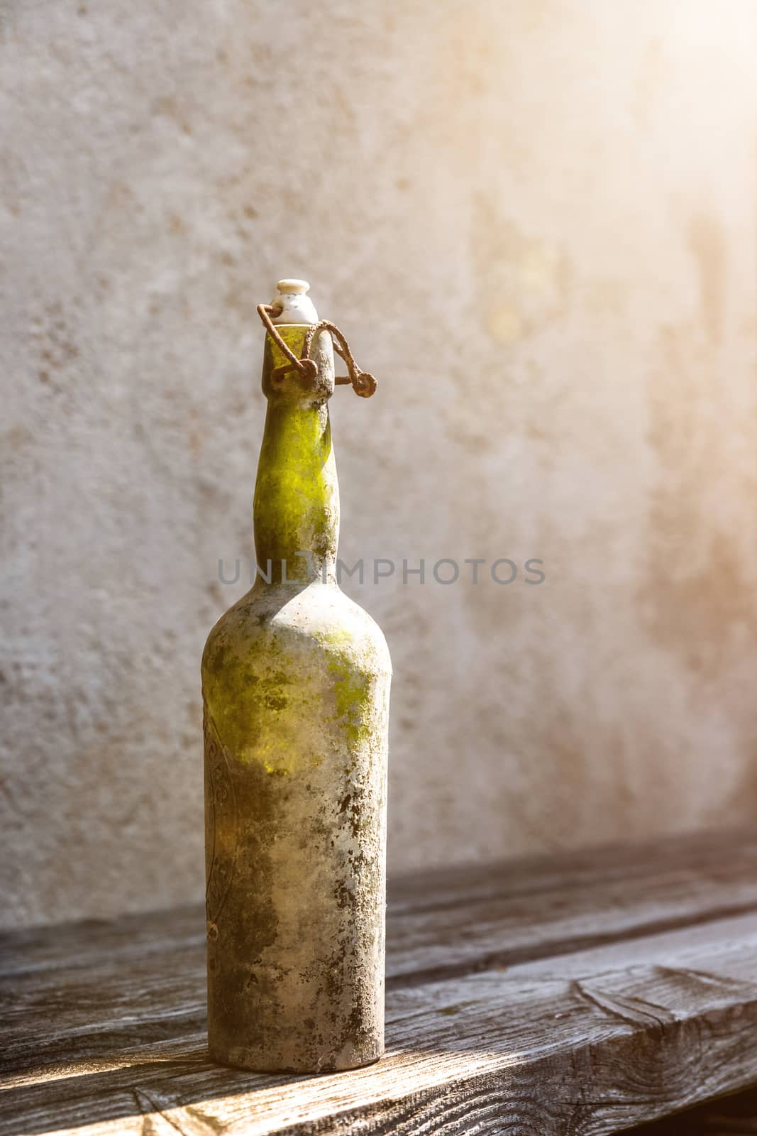 An image of a dirty old wine bottle