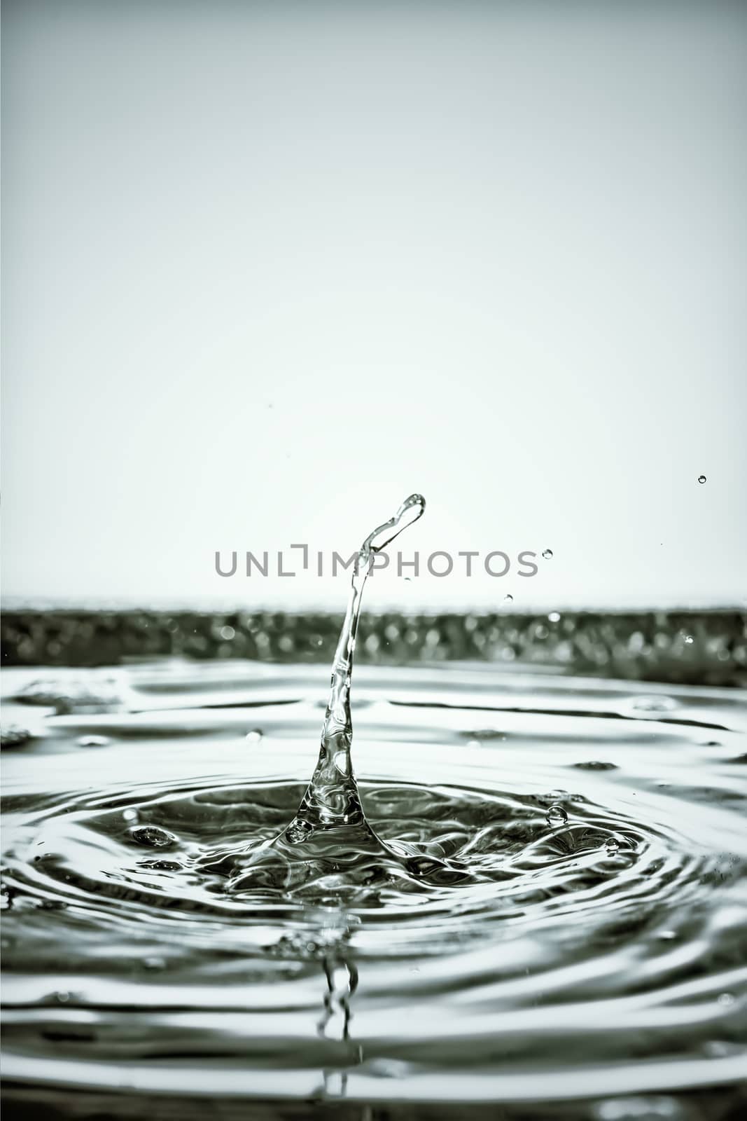 An image of a beautiful black water drop background