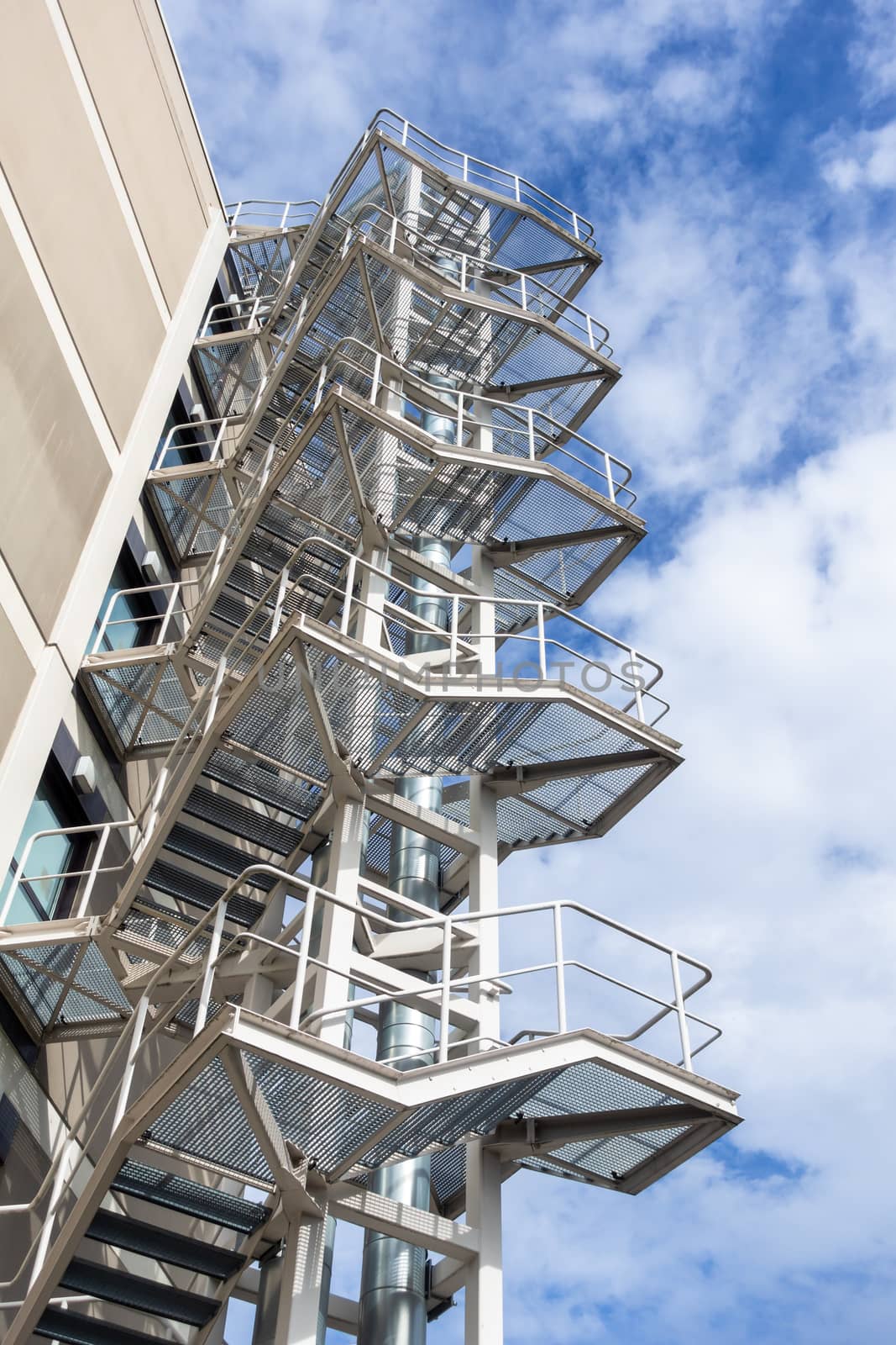 An image of some stairs at a high building