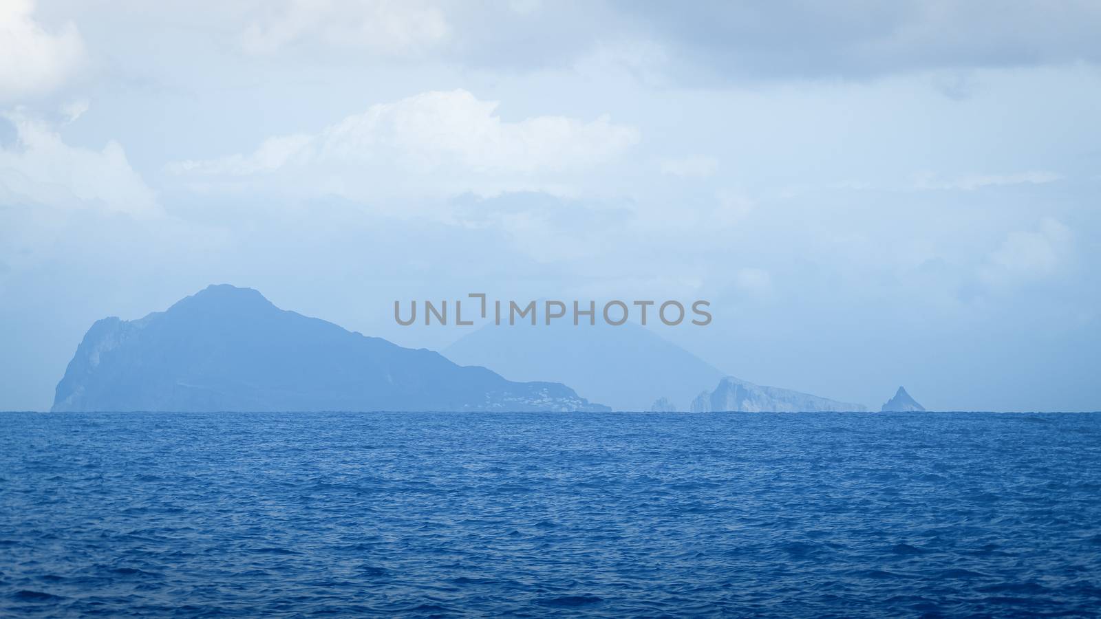 Lipari island in haze background by magann