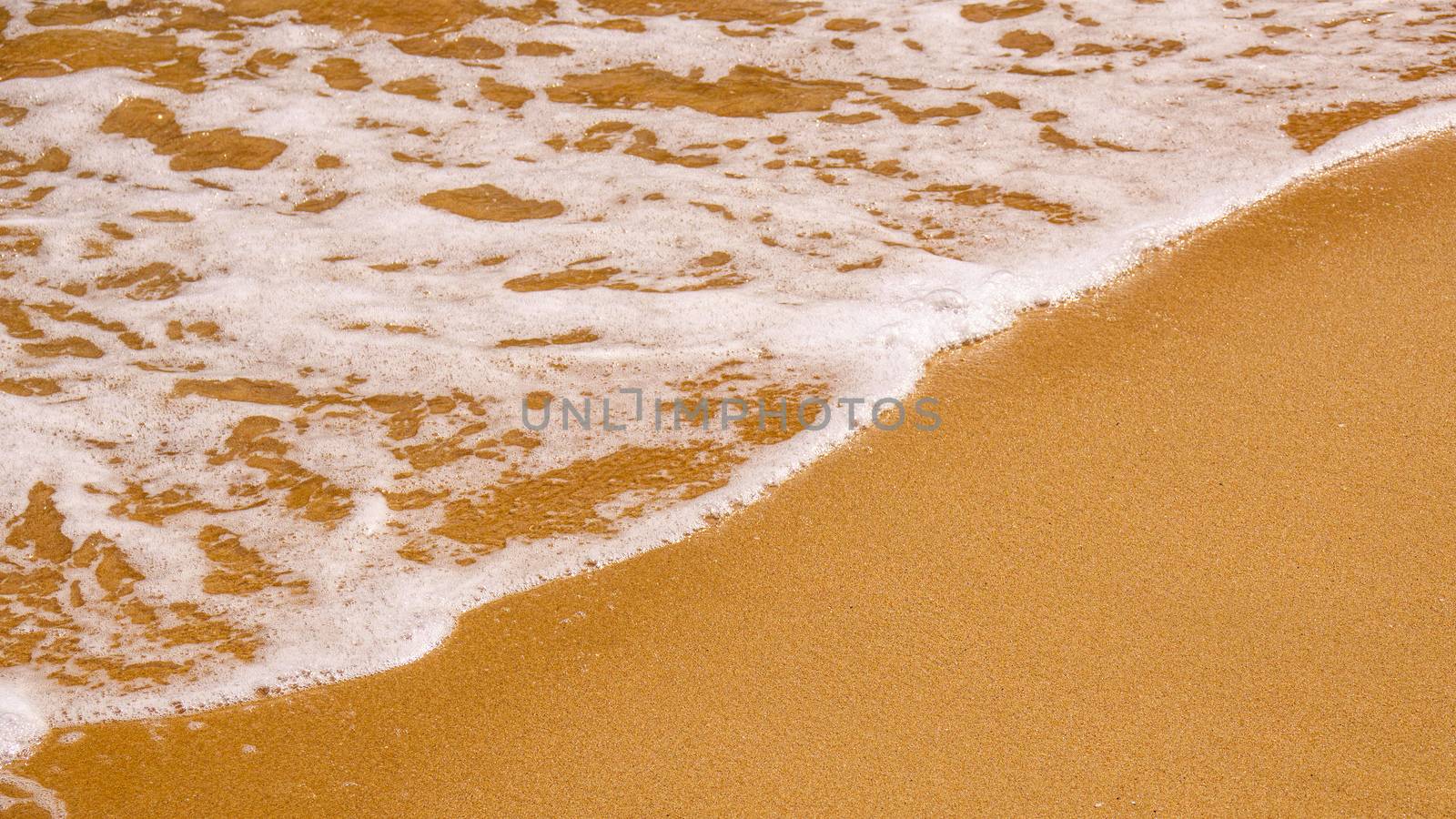 An image of a sandy beach shore line texture background