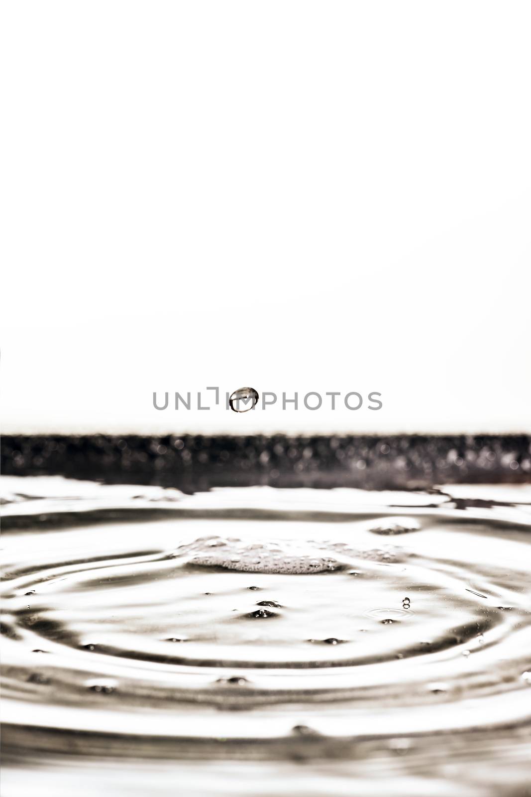 An image of a beautiful black water drop background