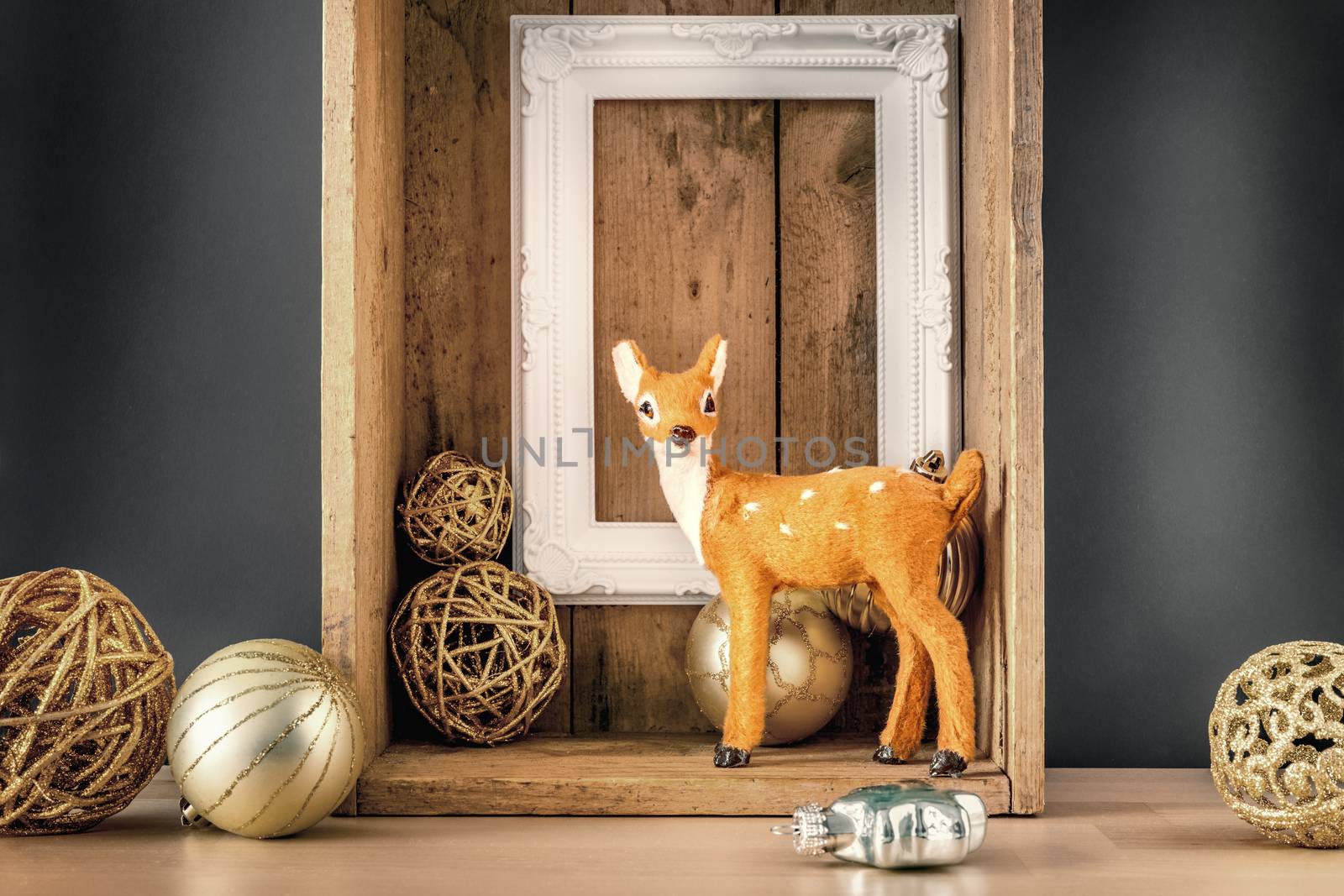 Christmas decoration wooden box with deer golden balls and a whi by magann