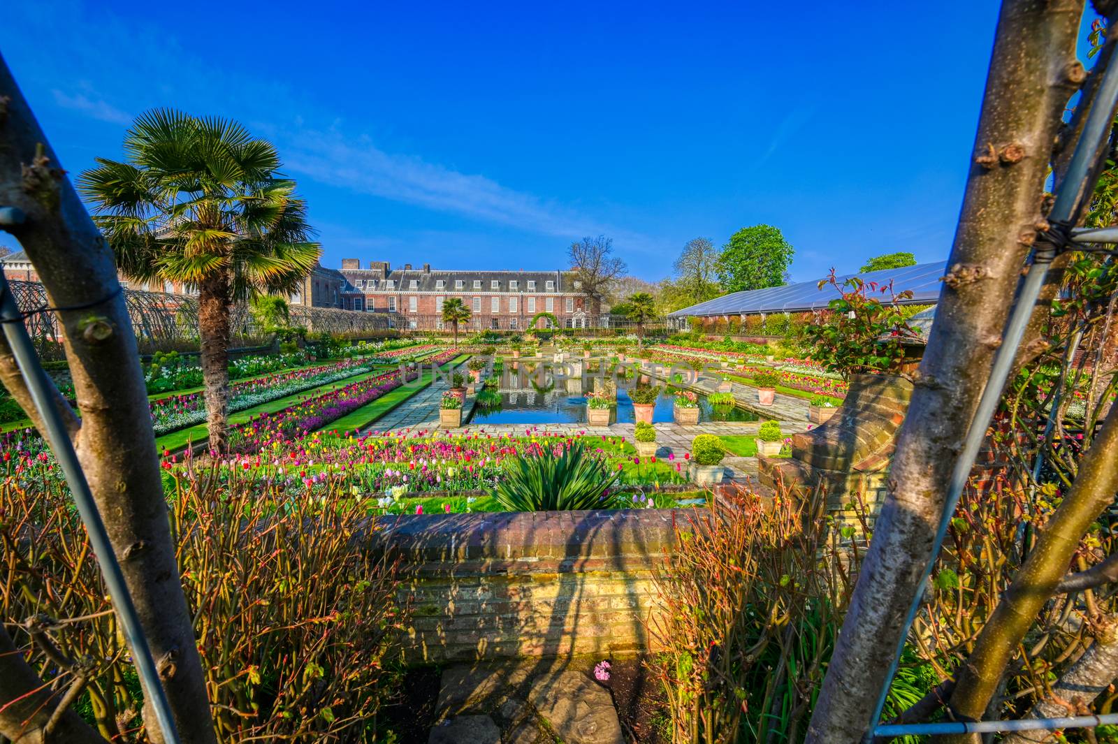 London, United Kingdom - April 17, 2019 : Kensington Palace gardens on a spring morning located in Central London, UK. 