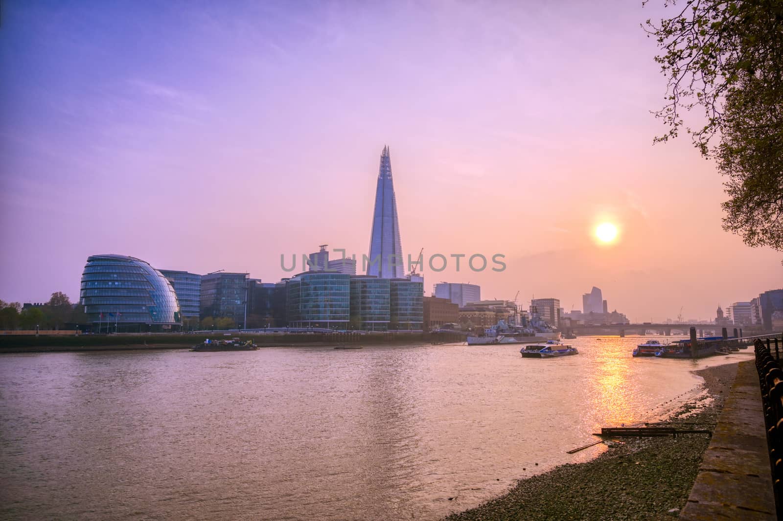 A view along the River Thames on at dusk in London, UK.