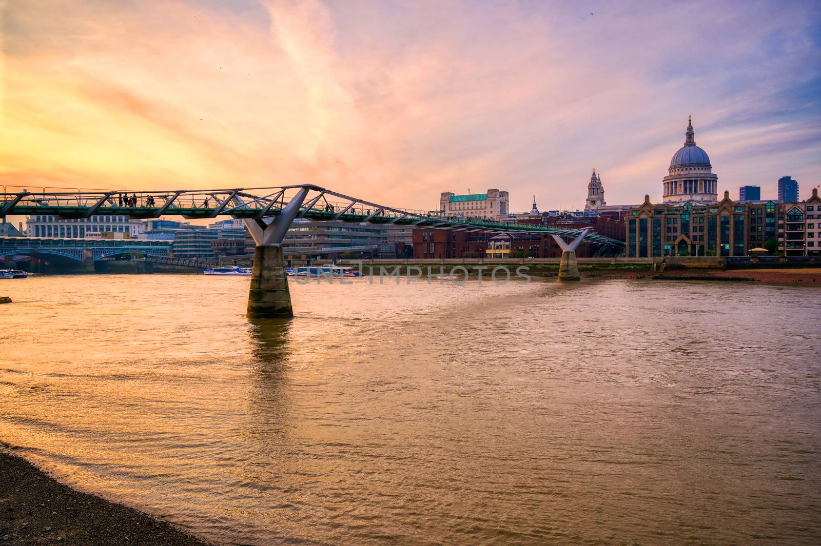 St. Paul's Cathedral across Millennium Bridge in London, UK by jbyard22