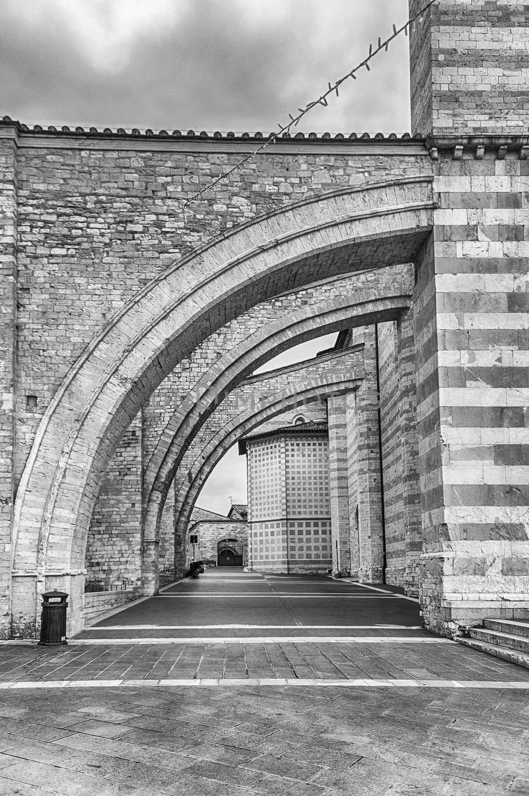 Scenic arches of the medieval Basilica of Saint Clare in Assisi, Italy