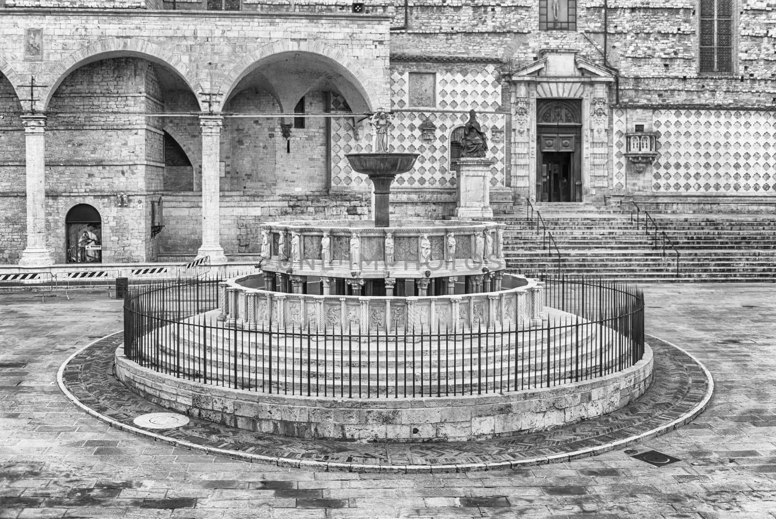 View of Fontana Maggiore, monumental medieval fountain located between the cathedral and the Palazzo dei Priori in the city of Perugia, Italy