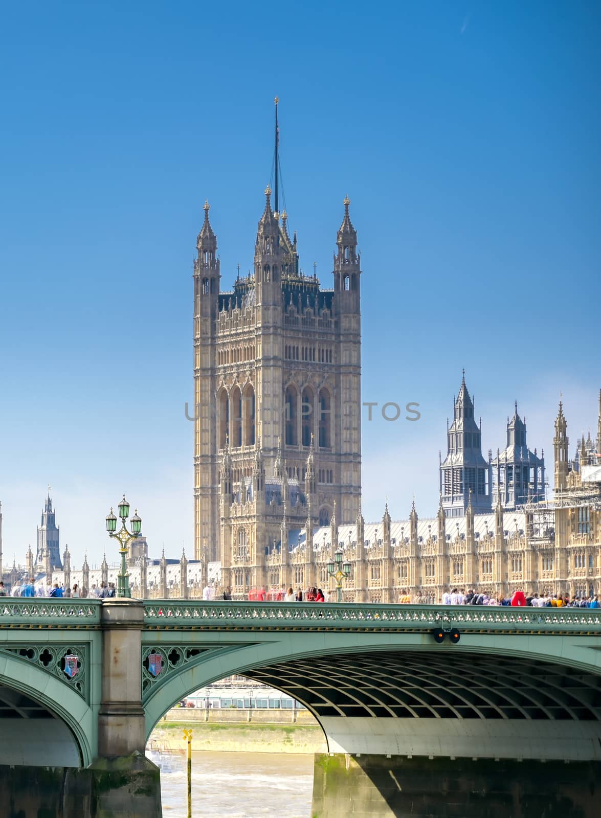 British Parliament along the River Thames on a sunny day in London, UK.