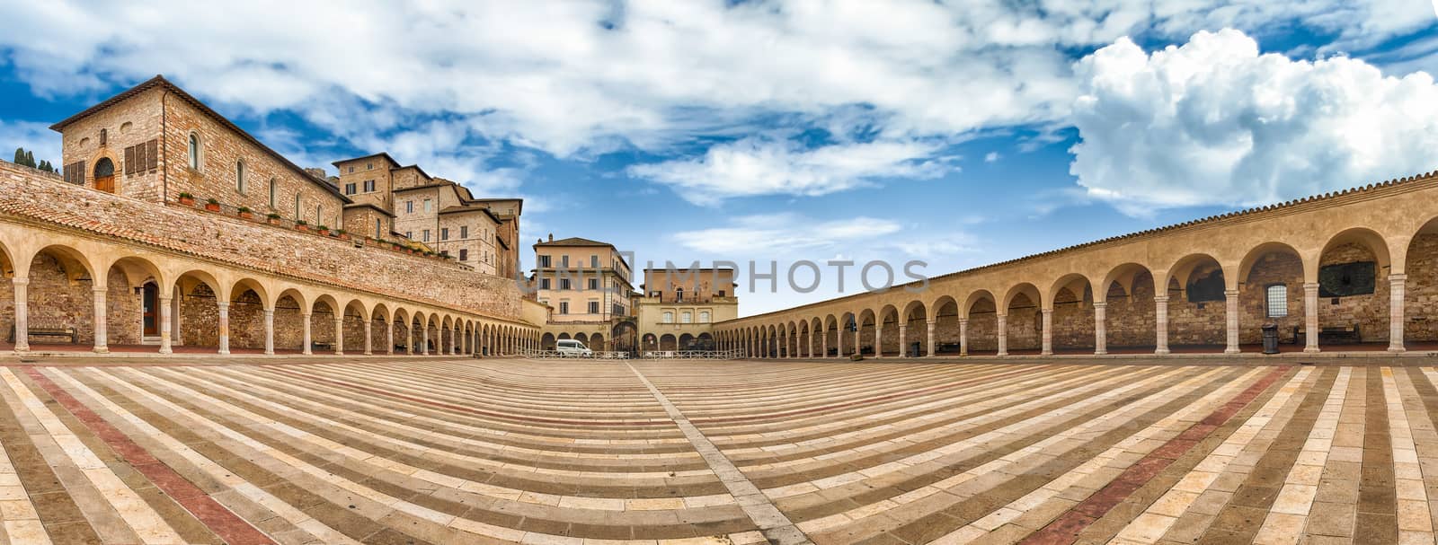 Panoramic view of the historic lower plaza of the Basilica of Saint Francis, Assisi, one of the most important places of Christian pilgrimage in Italy
