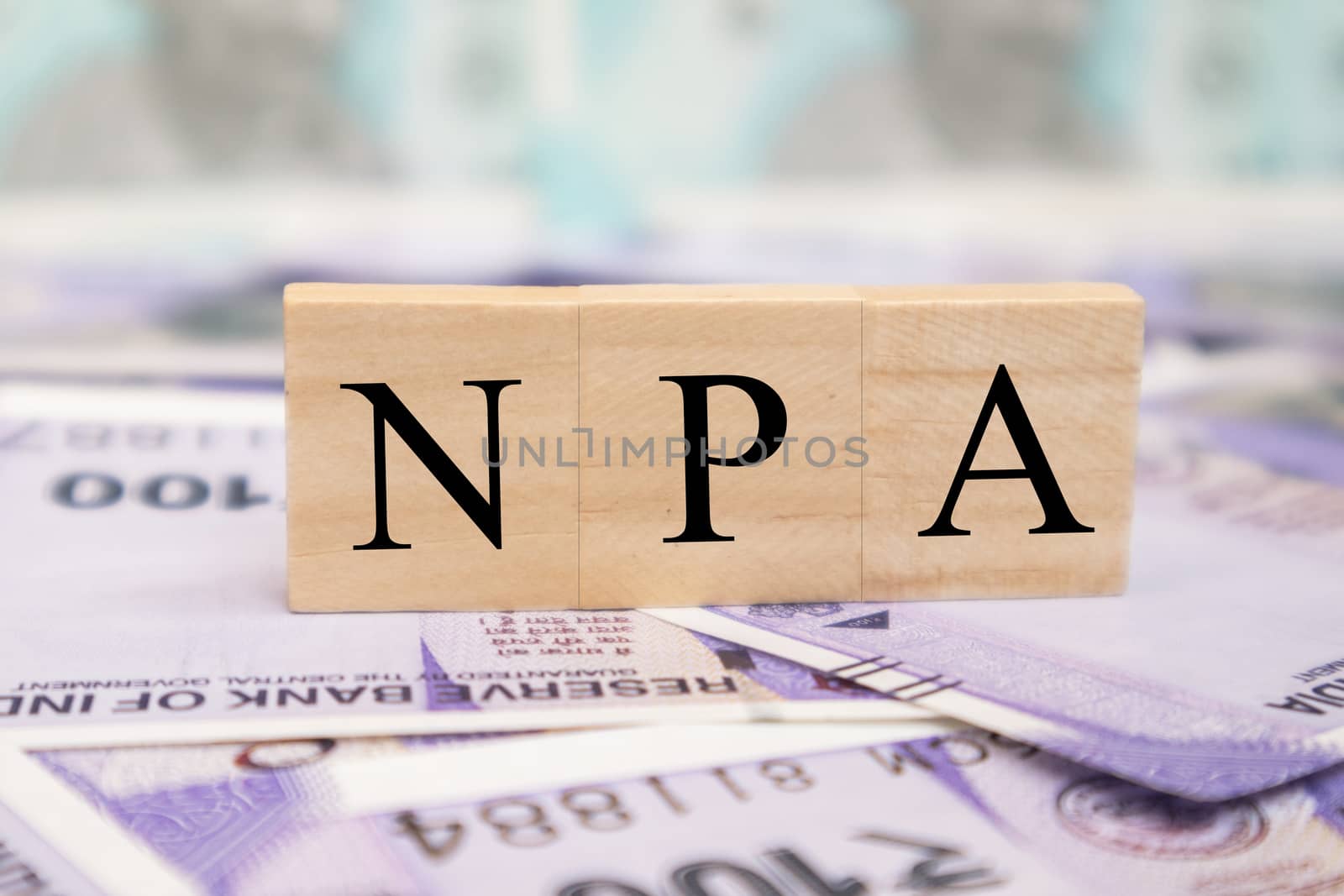 NPA or Non Performing Assets business concept on indian currency notes. by lakshmiprasad.maski@gmai.com