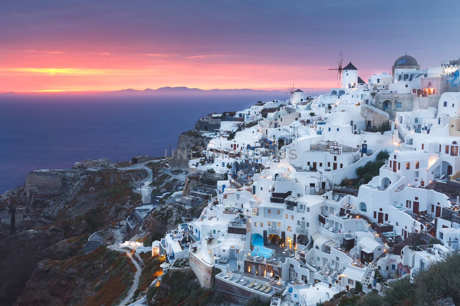Landscape of beautiful world famous  village of Oia, just after sunset, Santorini, Greece by Slast20