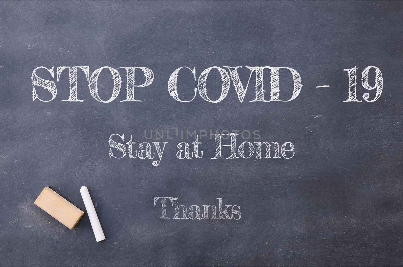 Stop Covid-19 Stay at Home thanks chalkboard inscription. by CreativePhotoSpain