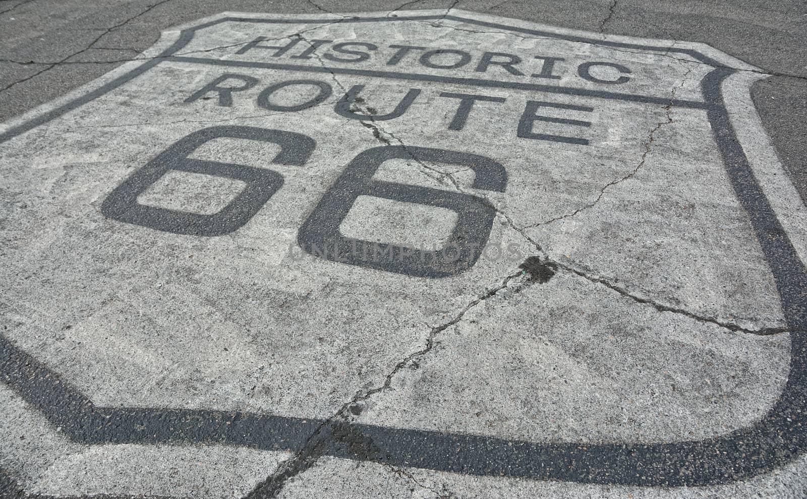 Sign of historic route 66 on the asphalt.