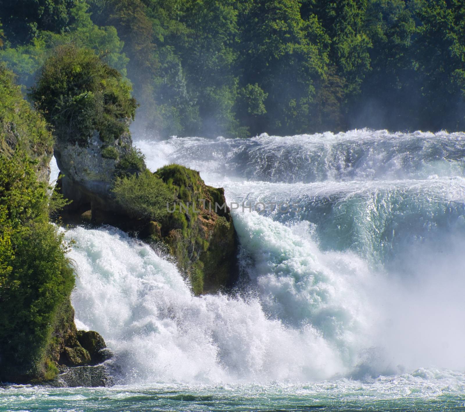 the famous rhine falls in the swiss near the city of Schaffhausen - sunny day and blue sky