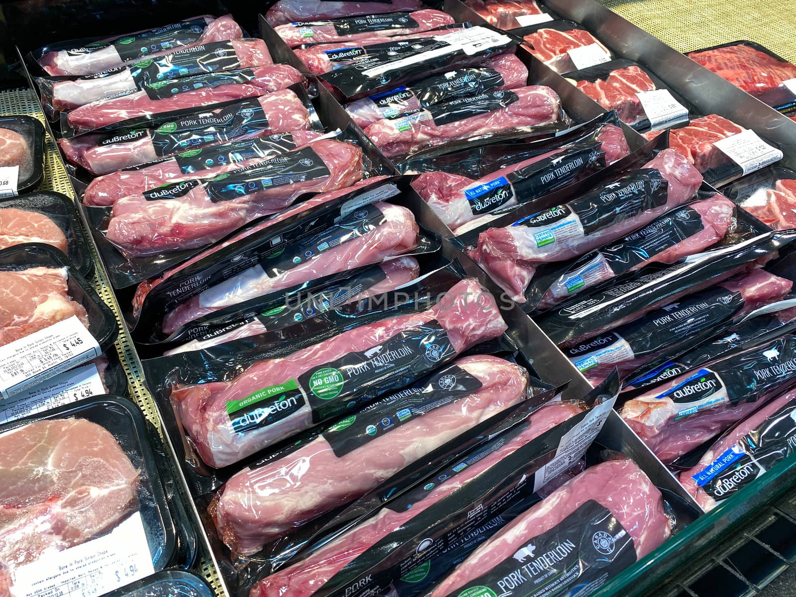 Orlando,FL/USA -5/10/20:  A refrigerated case of packaged pork tenderloin ready for customers to purchase at a Whole Foods Market grocery store.