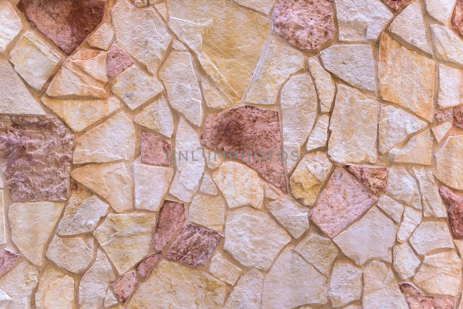 Background or texture made of red stone wall
