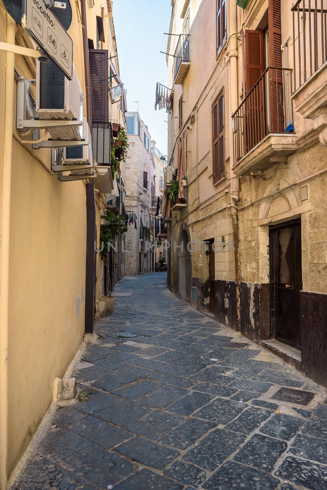 Characteristic narrow street in the old town of Bari, Apulia, Italy