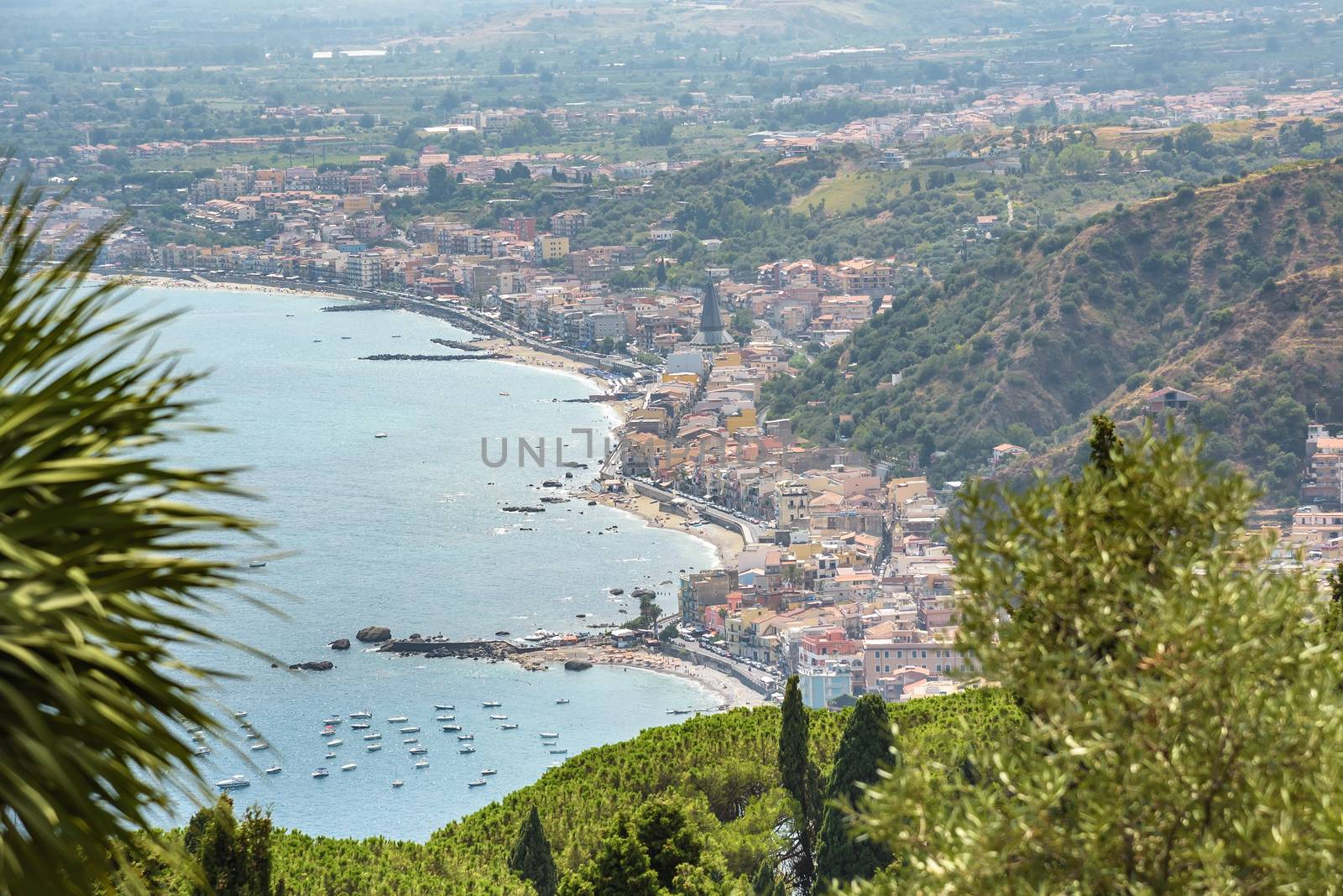 View of Giardini Naxos town from Taormina, Sicily, Italy