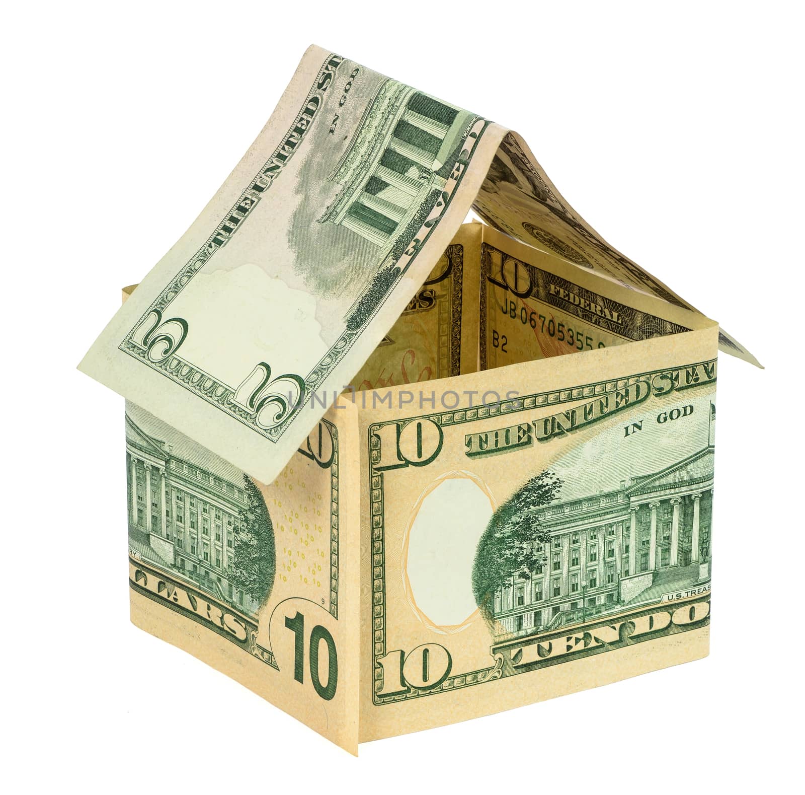 Model house made from dollar banknotes isolated on white background with clipping path