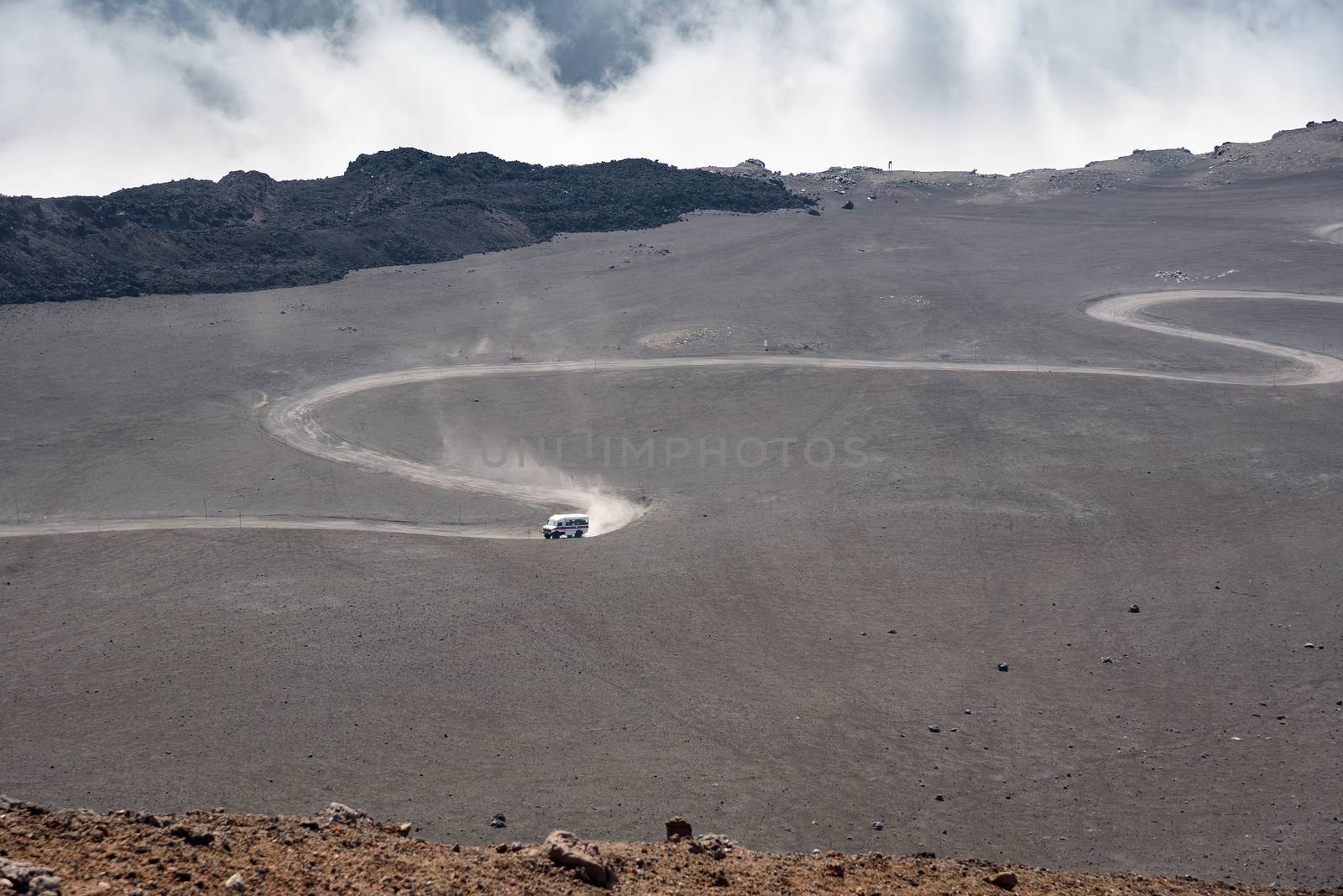 Road on the lava field to the top of Mount Etna, Sicily, Italy