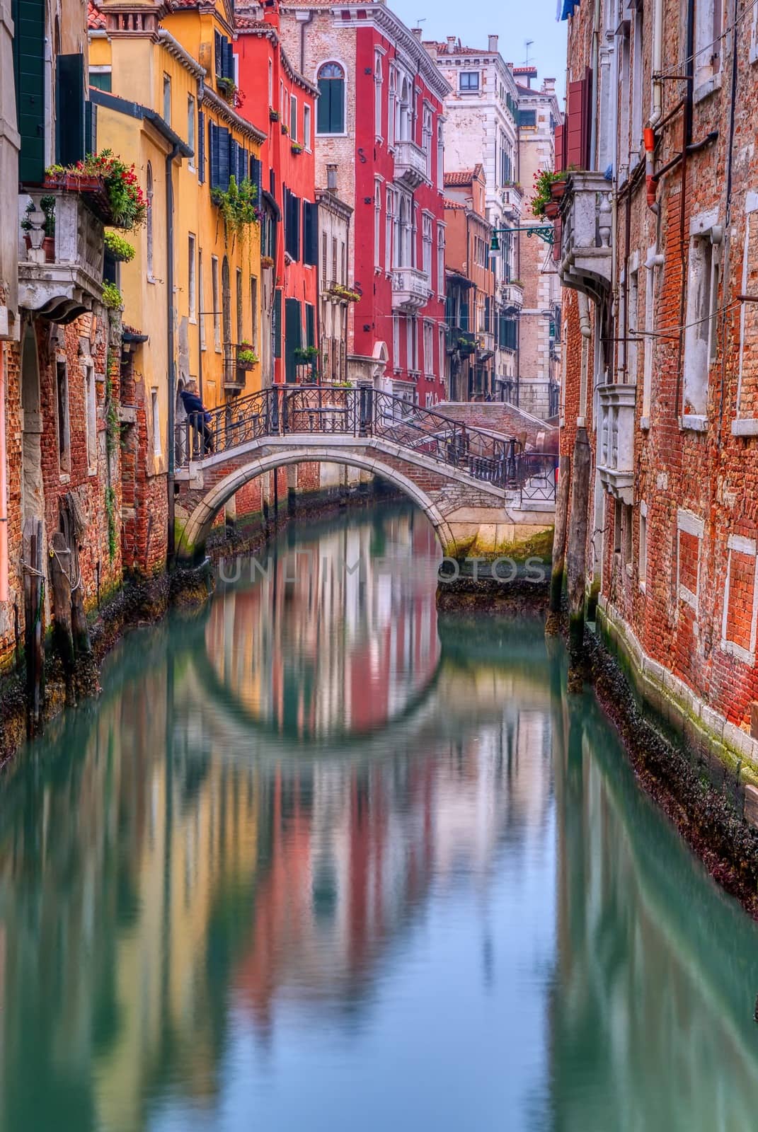 Lonely canal in Venice at sunrise, Italy