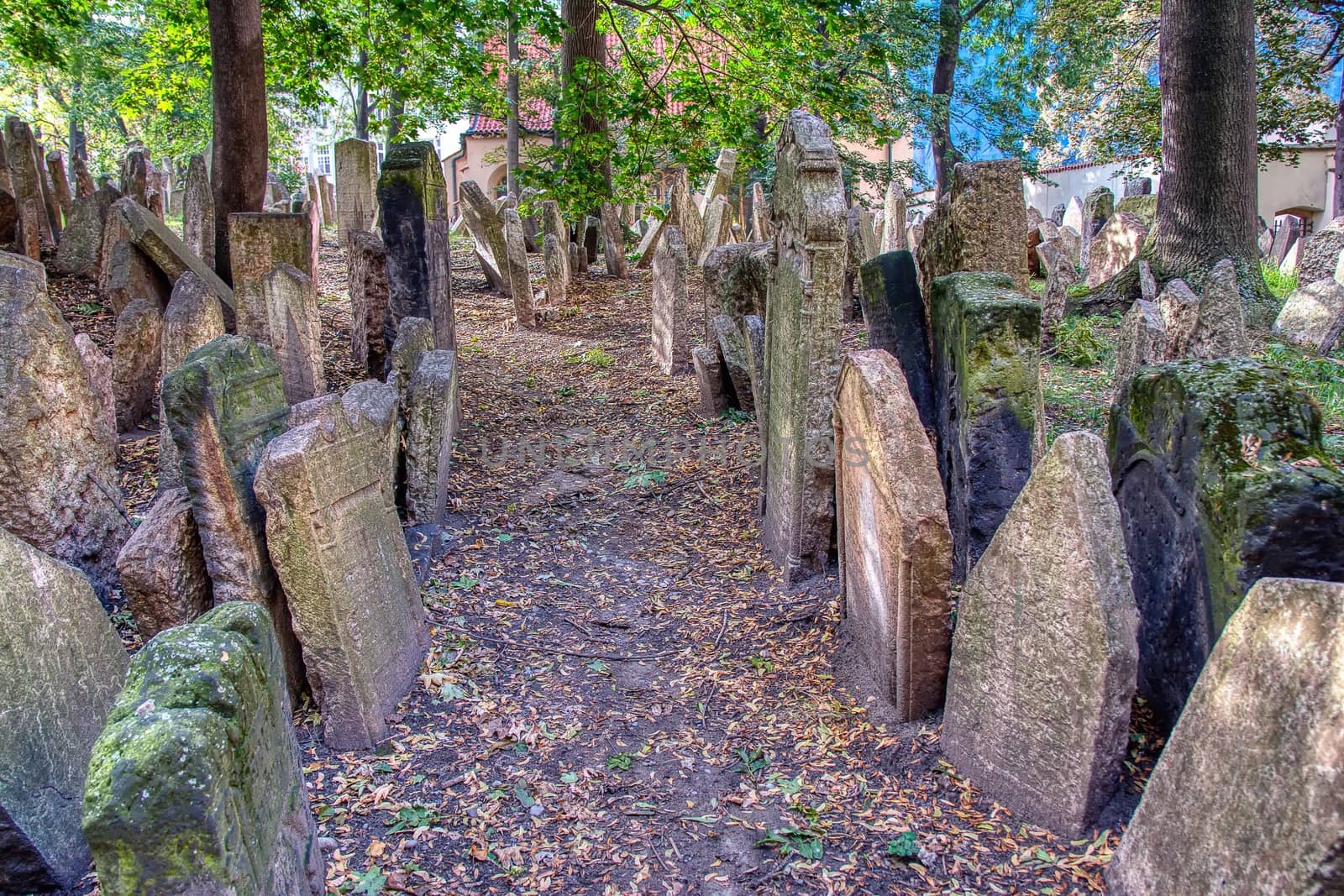 Tombstones on Old Jewish Cemetery in the Jewish Quarter in Prague. by CreativePhotoSpain