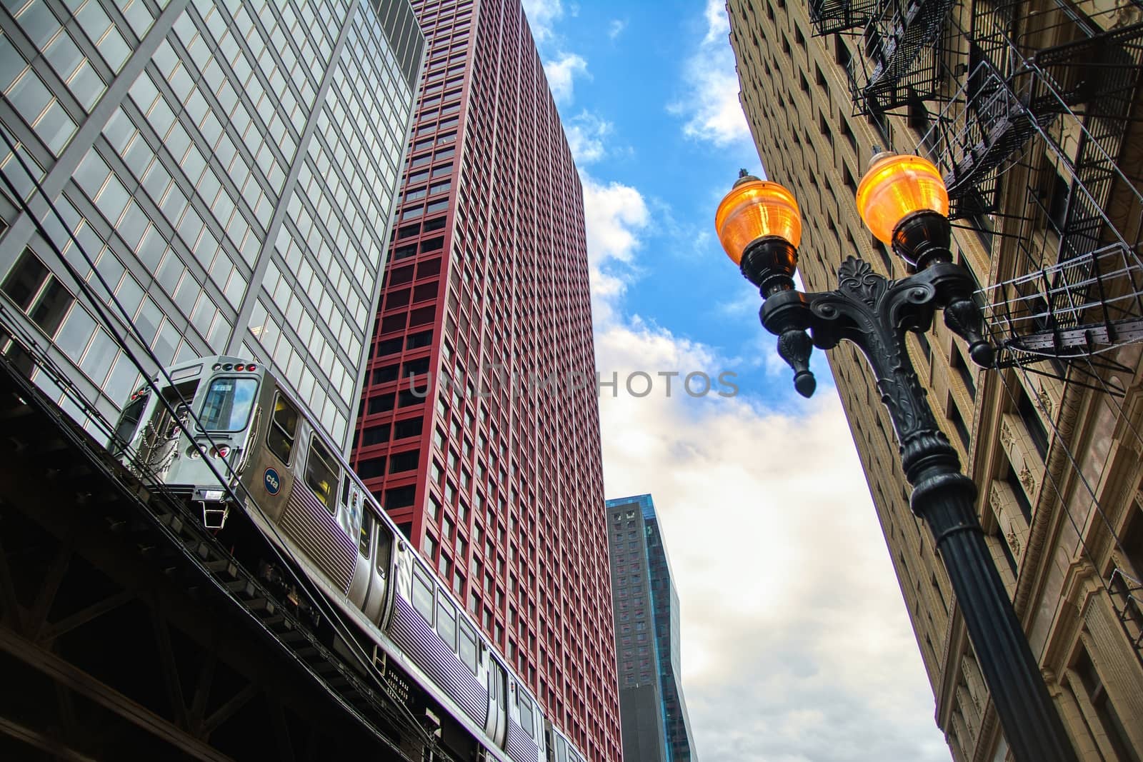 Chicago, Illinois - July 16, 2017: A CTA train heading into the city of Chicago.Train in Chicago on the track transporting passengers around the city.