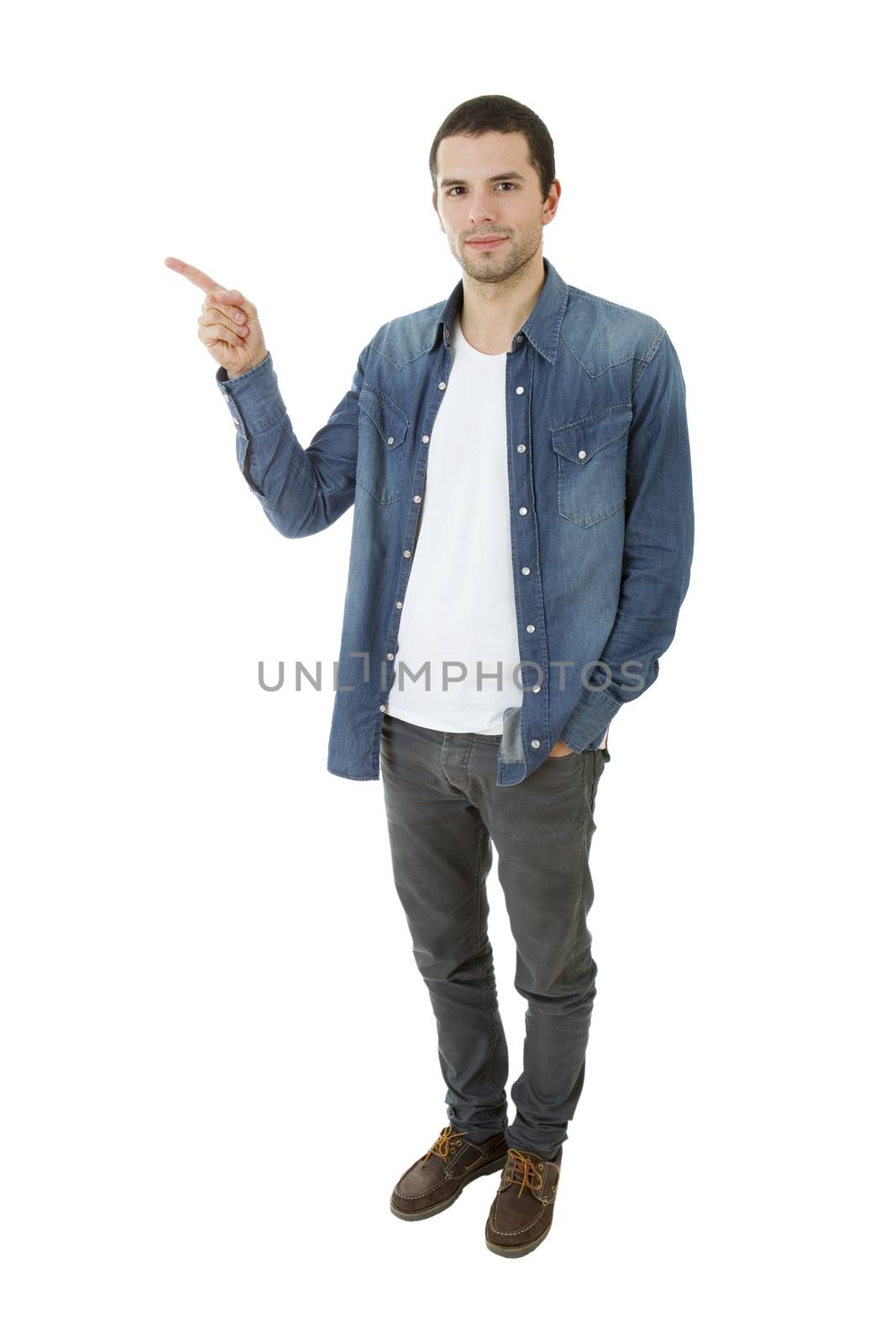 young casual man pointing, full length, isolated on white