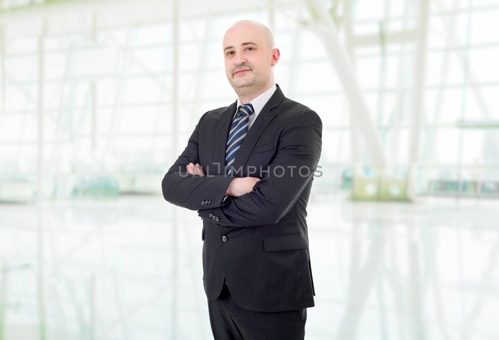 happy business man portrait at the office