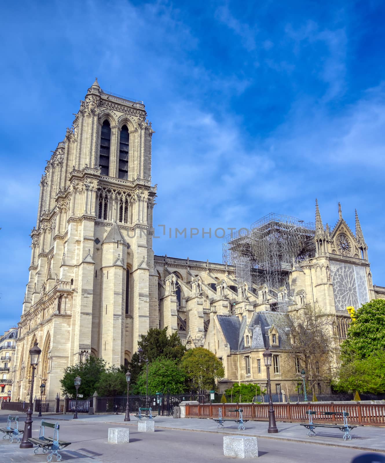 Paris, France - April 21, 2019 - Notre Dame Cathedral on the Seine River in Paris, France after the fire on April 15, 2019.