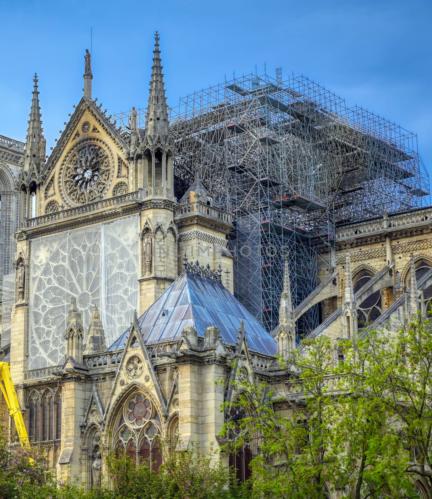 Paris, France - April 21, 2019 - Notre Dame Cathedral on the Seine River in Paris, France after the fire on April 15, 2019.