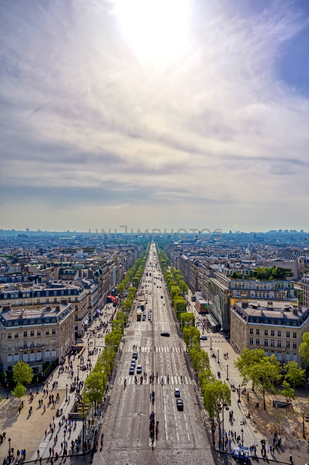 A view of Paris, France from the Arc de Triomphe on a sunny day.