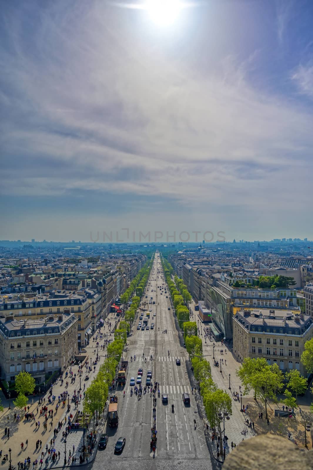 A view of Paris, France from the Arc de Triomphe on a sunny day.