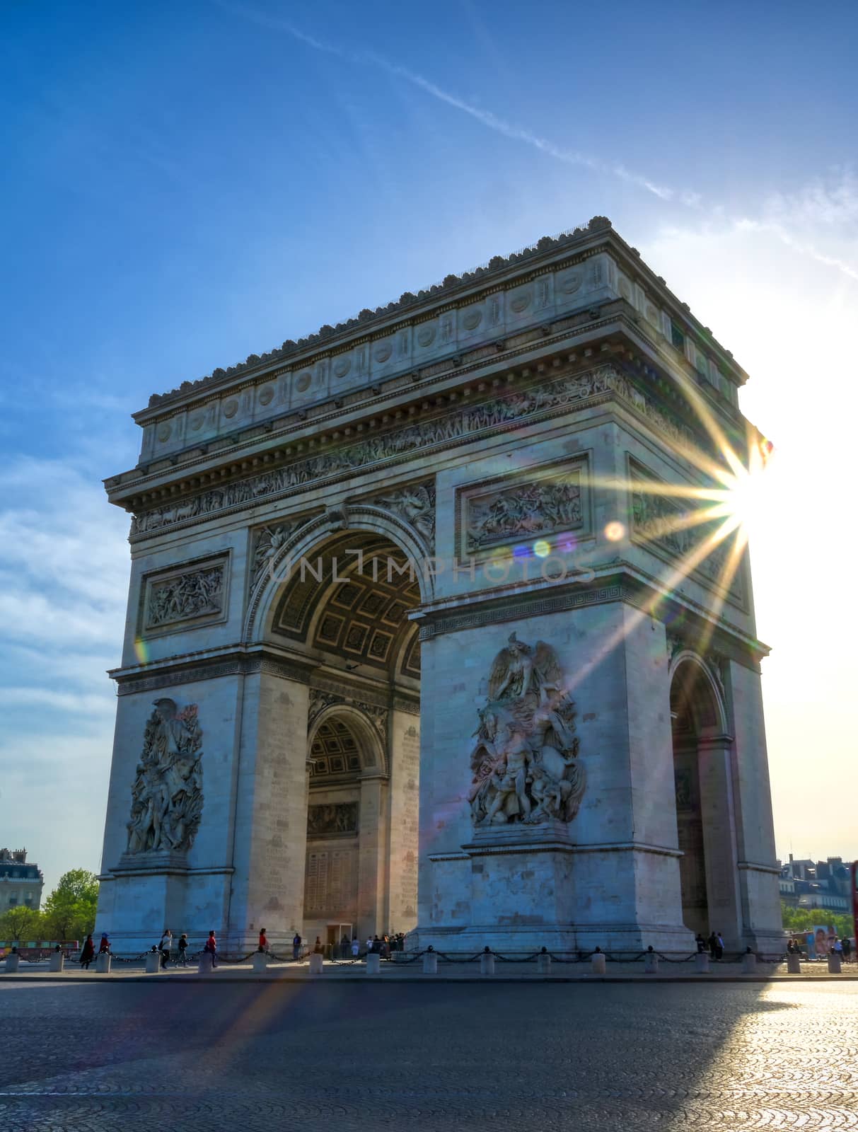 A view of the Arc de Triomphe located in Paris, France.