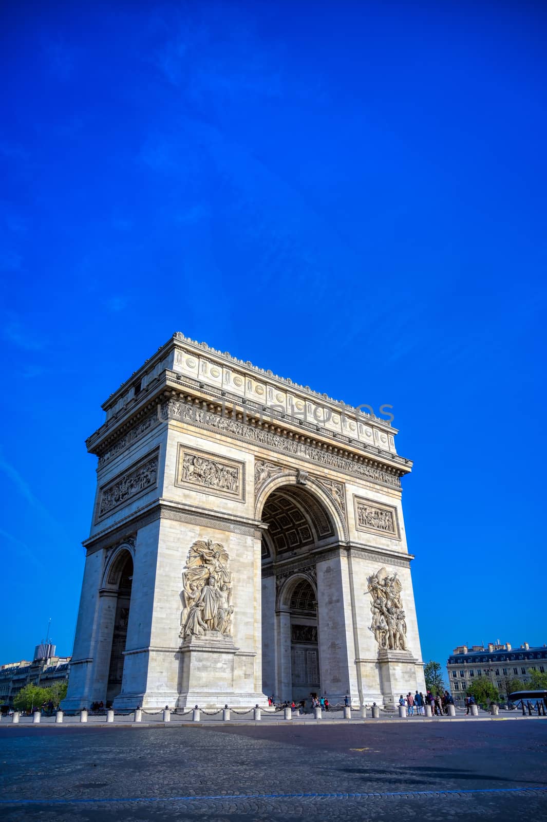 A view of the Arc de Triomphe located in Paris, France.