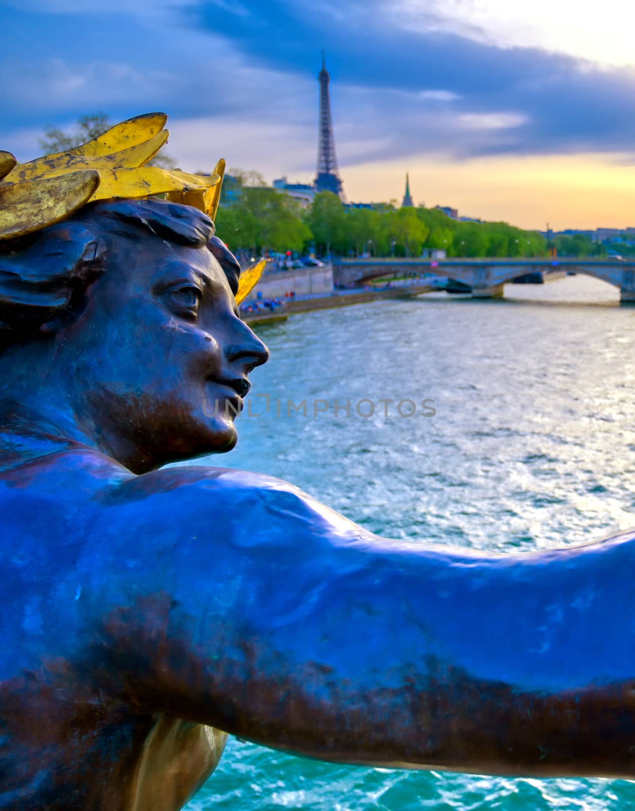 A view from the Pont Alexandre III bridge that spans the Seine River in Paris, France