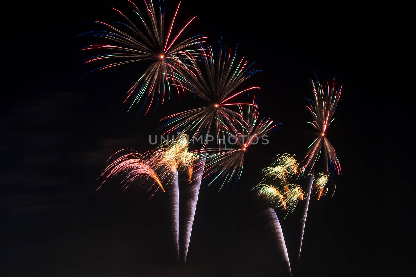 Colorful fireworks display at holiday night.