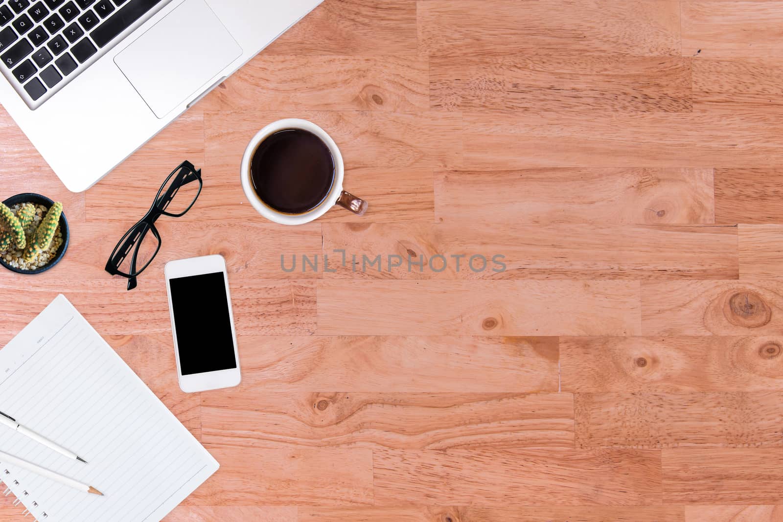 Top view of  white office desk table. by NuwatPhoto