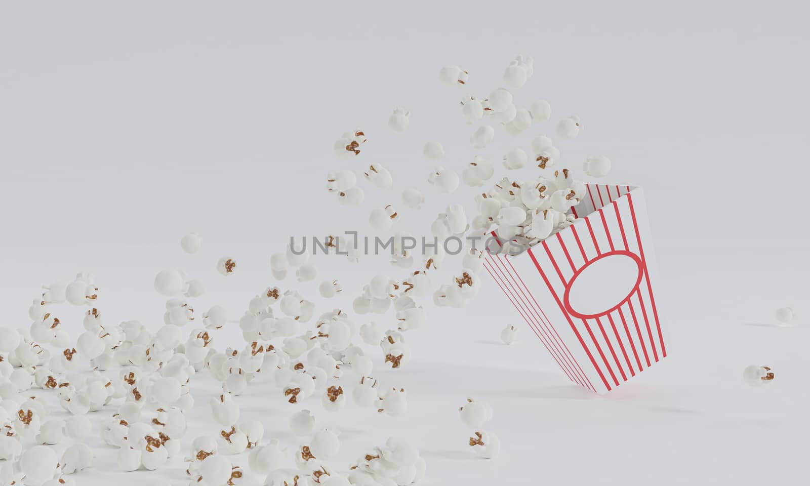 Popcorn in red and white striped cardboard bucket isolated on white background