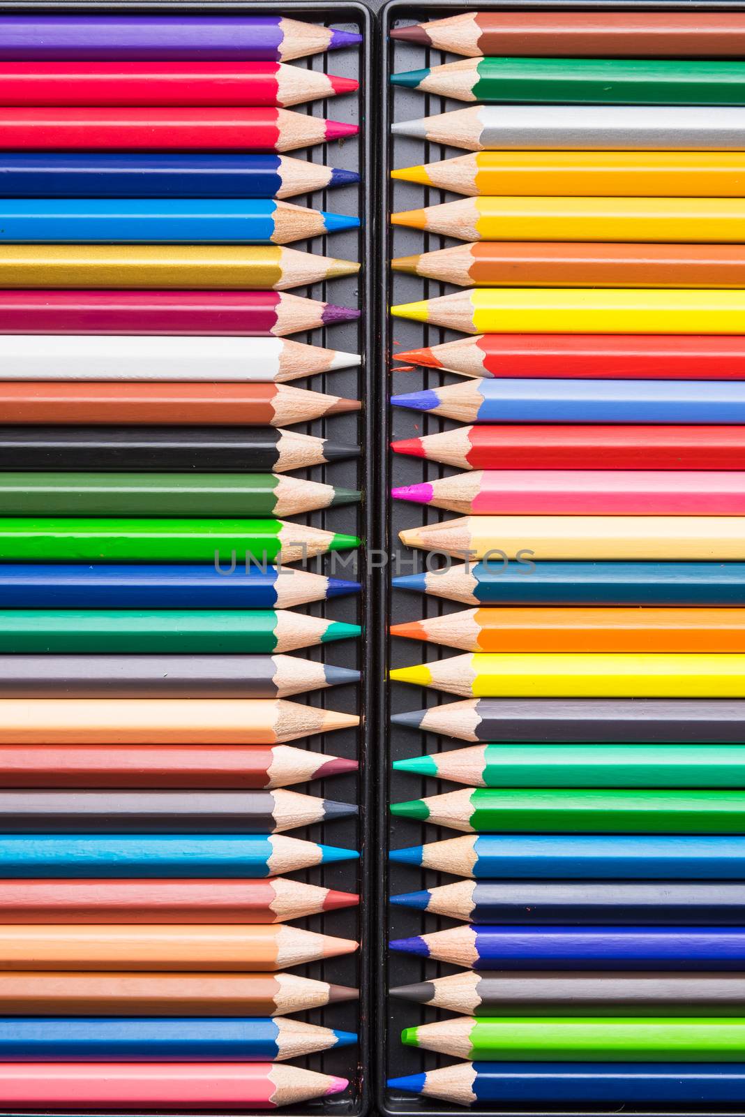 Color Pencils with plastic case isolated on Black Background clo by Bubbers